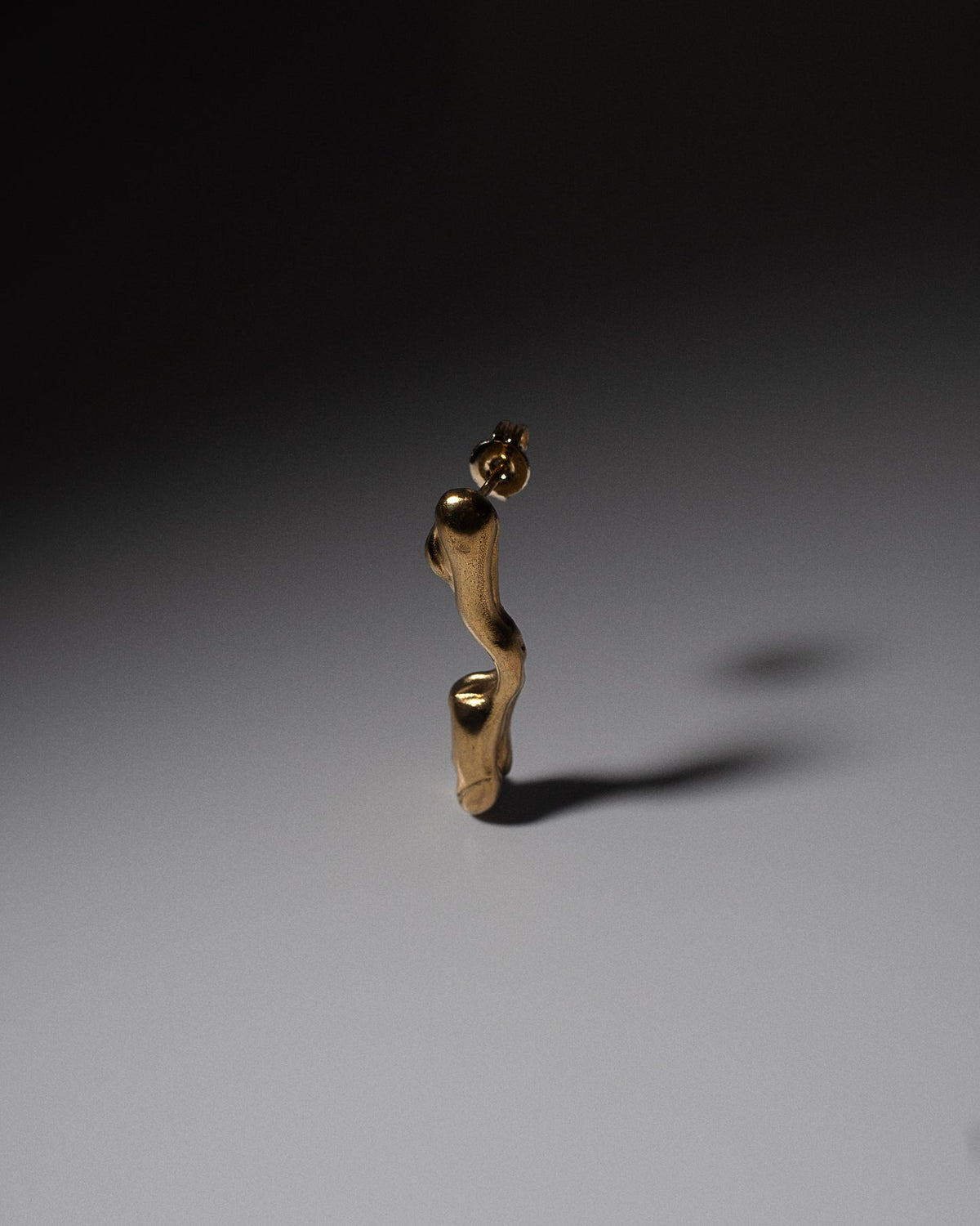 Gold crybaby earring