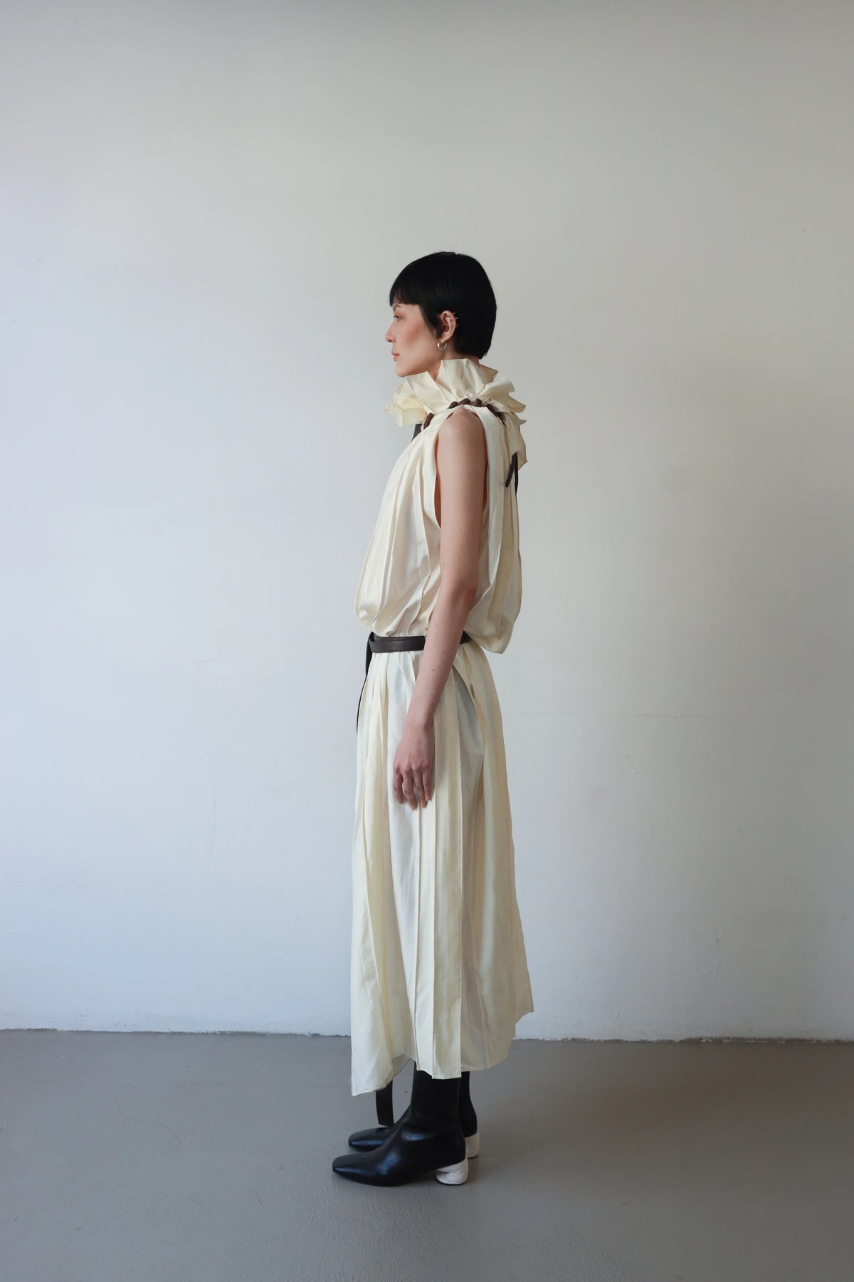 Leather knot pleats dress