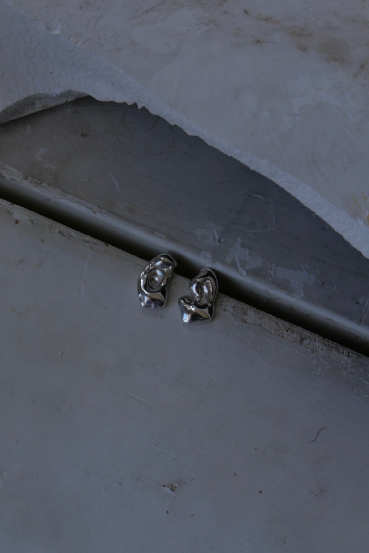 Tension pool earrings