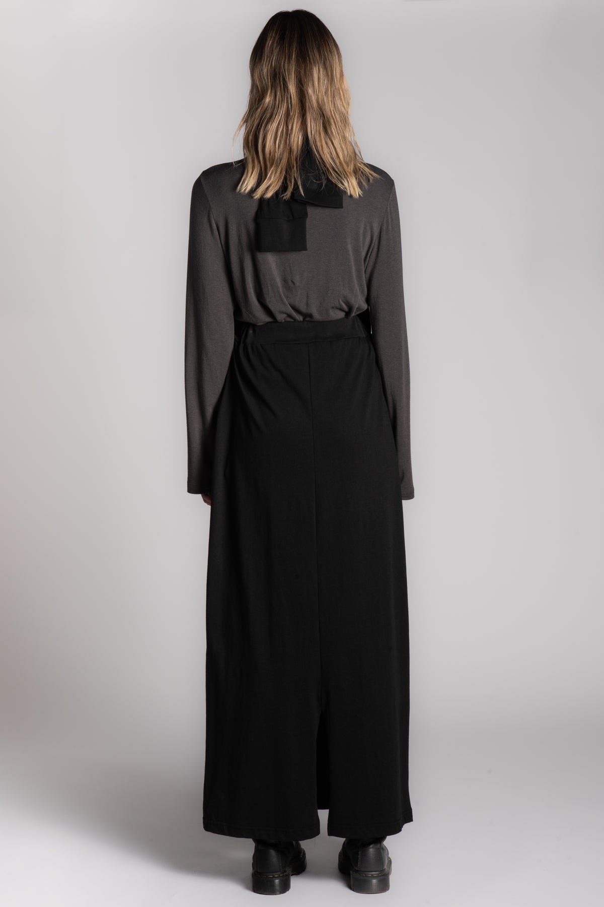 Black cotton skirt with long sleeve attachment