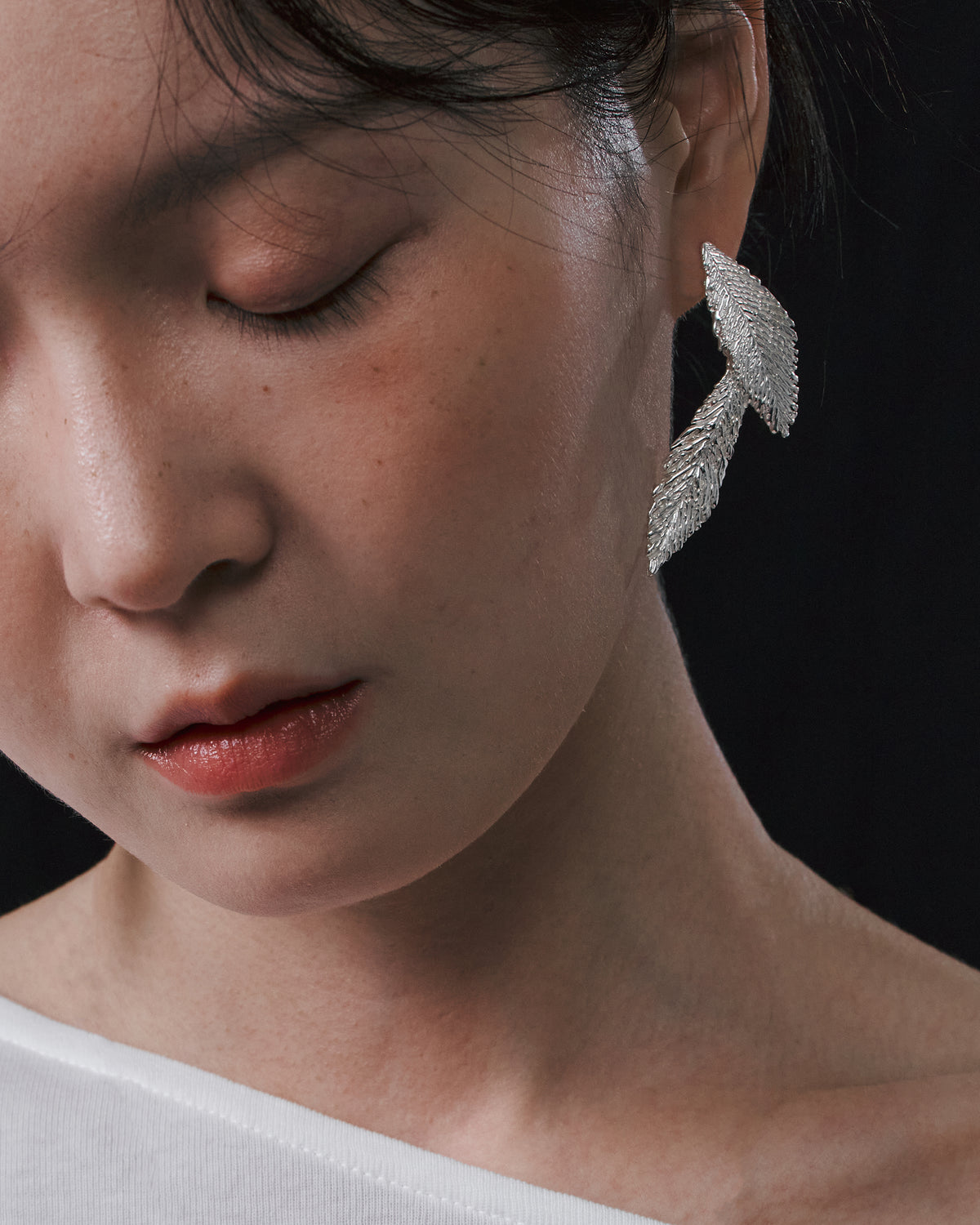 Feathers earrings (two)