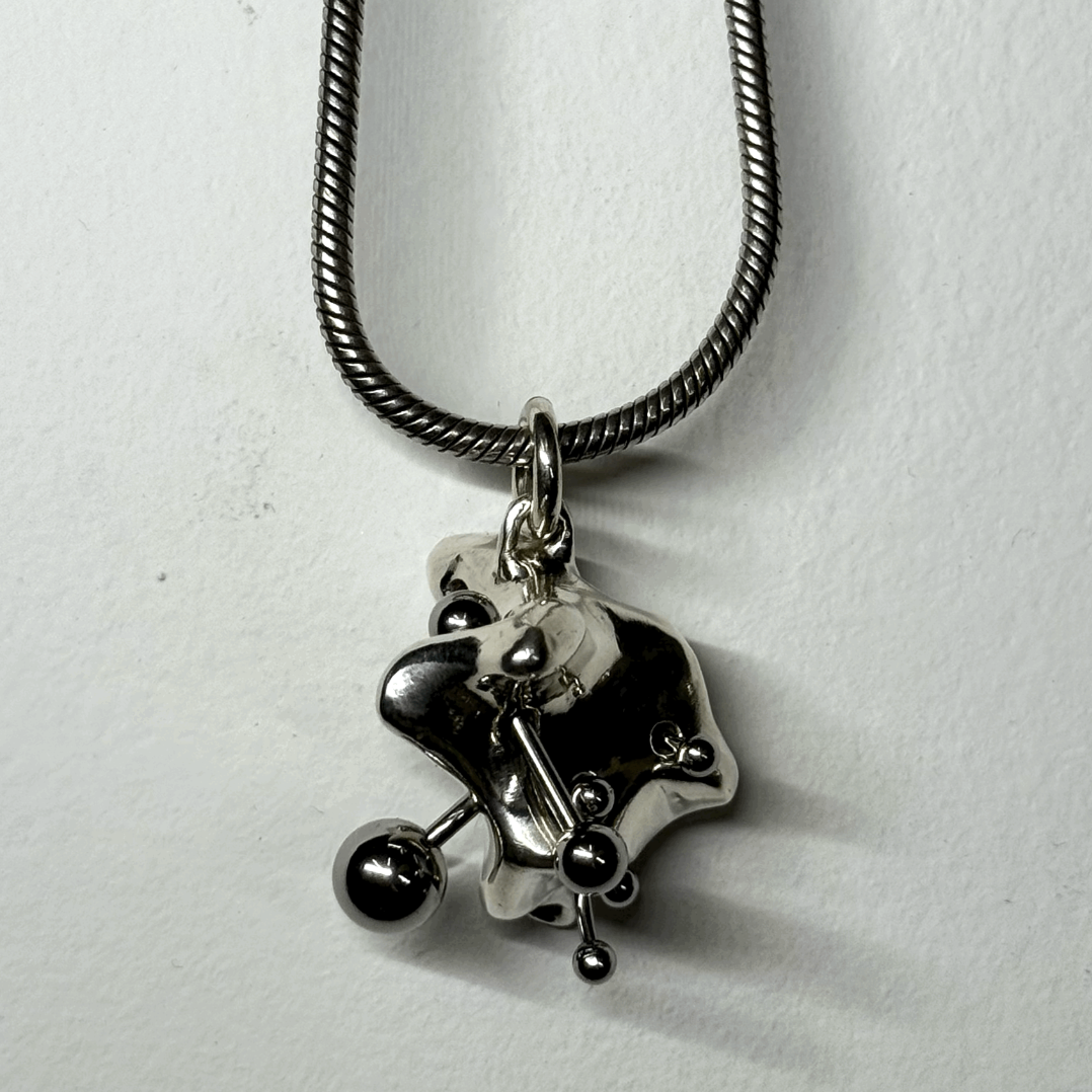 Reverse piercing ear canal (pendant only)